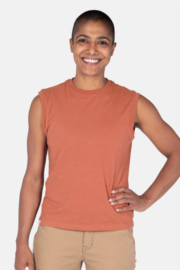 Dovetail Workwear GO TO™ Tank Top in Terracotta worn by a woman, showcasing the relaxed fit, perfect neckline coverage, and soft 100% ring-spun cotton construction