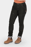 Maven Slim Pant in Heathered Black Graphene by Dovetail Workwear, shown cuffed on a woman wearing work boots, displaying reinforced thigh panels and nested pockets