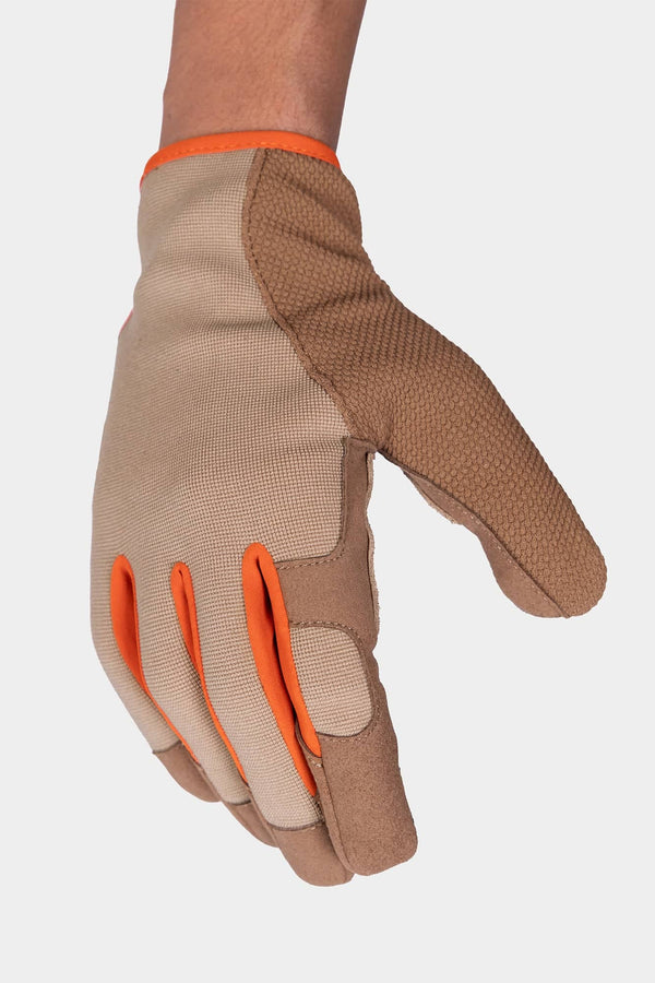 Detail view of Dovetail Workwear Multi-Purpose Work Gloves in Light Kodiak, showing the split leather palm on a woman's hand
