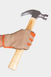 Woman wearing Dovetail Workwear Multi-Purpose Work Gloves in Light Kodiak, holding a claw hammer to demonstrate grip and protection