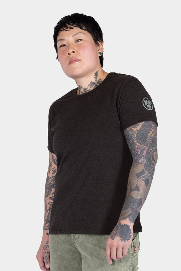 Black GO TO™ Crew Neck Tee Shirt from Dovetail Workwear worn by a woman, shown from the front with relaxed fit and cotton jersey blend fabric visible