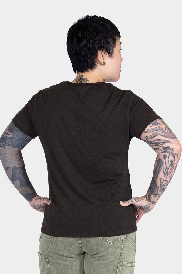 Back view of a woman wearing Dovetail Workwear GO TO™ Crew Neck Tee Shirt in Black with relaxed fit and cotton jersey blend fabric