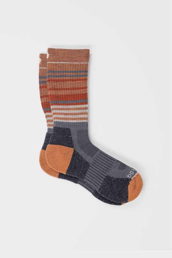 Dovetail Workwear Women's Merino Wool Work Socks in Midweight Burnt Orange Stripe shown flat lay, displaying horizontal stripes, cushioned sole, and reinforced heel and toe in contrasting colors