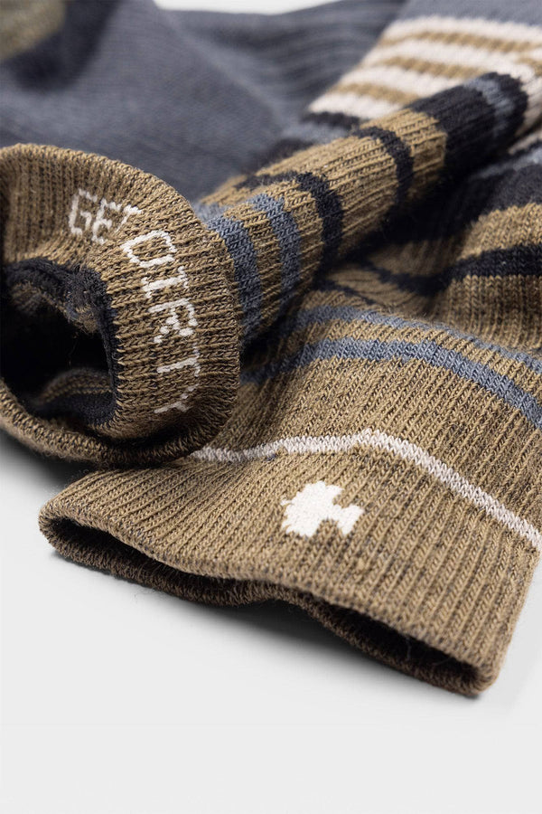Detail shot of Dovetail Workwear Women's Merino Wool Work Socks in Midweight Kelp Green Stripe and Heavy Duty Dove Grey, displaying seamless toe construction and zoned cushioning