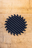 Black Denim Pocket Patch from Dovetail Workwear x NoSo DIY Repair Patches, featuring a pocket patch design, displayed on natural wood surface