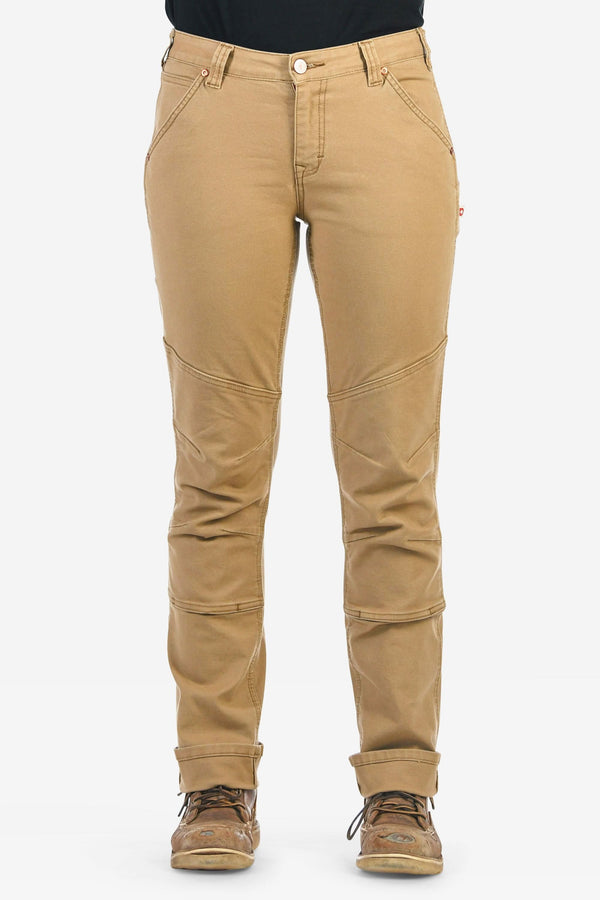 Front view of a woman wearing Dovetail Workwear GO TO™ Stretch Canvas Pant in Sawdust Brown, featuring articulated knees and a straight leg silhouette