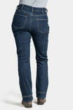Back view of a woman wearing Dovetail Workwear's Britt X Pant Power Hemp in Indigo, showcasing reinforced knees, nested pockets, and straight-leg silhouette