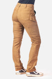 Back view of a woman wearing the Maven X Pant in Saddle Brown Canvas by Dovetail Workwear, showing the slim leg fit and reinforced knee design