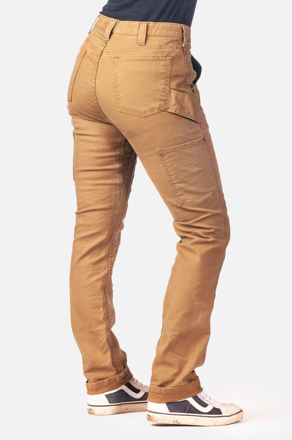 Back view of a woman wearing the Maven X Pant in Saddle Brown Canvas by Dovetail Workwear, showing the slim leg fit and reinforced knee design