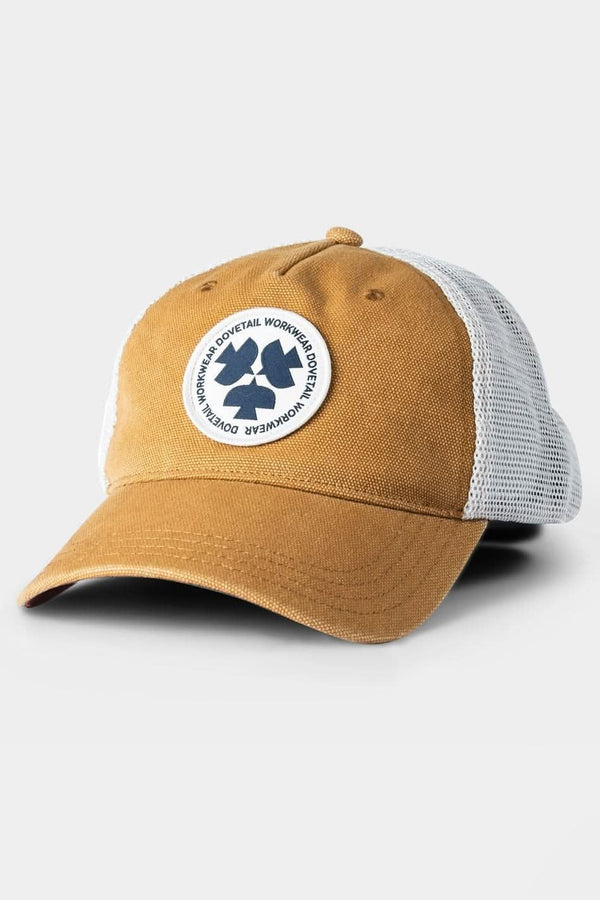 Saddle Brown Dovetail Workwear Trucker Hat with breathable mesh back and circular Dovetail patch logo, displayed against a light background