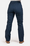 Back view of a woman wearing Dovetail Workwear's Anna Taskpant in Uniform Navy Canvas, showcasing nested pockets, reinforced knees, and a straight leg silhouette