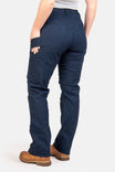 Back view of a woman wearing Dovetail Workwear's Anna Taskpant in Uniform Navy Canvas, showcasing the reinforced knees, nested pockets, and straight leg silhouette