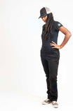 Dovetail Embroidered Shop Cap in Blue/Black worn by a woman with dreadlocks, styled with a black t-shirt and dark jeans, shown in a full-length standing pose against a white background