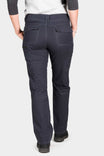 Back view of a woman wearing Dovetail Workwear's Day Construct Pant in Lightweight Dark Navy Ripstop, showcasing the relaxed fit, nested pockets, and reinforced knee area with kneepad slot details