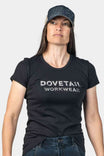 Woman wearing Dovetail Workwear black t-shirt and blue/black denim cap with mesh, front view against white background