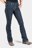 DX Bootcut Pant in CORDURA® Indigo Denim by Dovetail Workwear, front view on a woman wearing brown cowboy boots, showcasing the bootcut silhouette and visible EZWaist™ tool loop detail