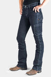 DX Bootcut Pant in CORDURA® Indigo Denim by Dovetail Workwear, shown on a woman wearing brown cowboy boots, featuring visible tool loop and articulated knee seams