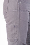 Detail shot of the Britt Utility Pants in Dark Grey Canvas by Dovetail Workwear, highlighting nested pockets, tool loop, and reinforced knee articulation